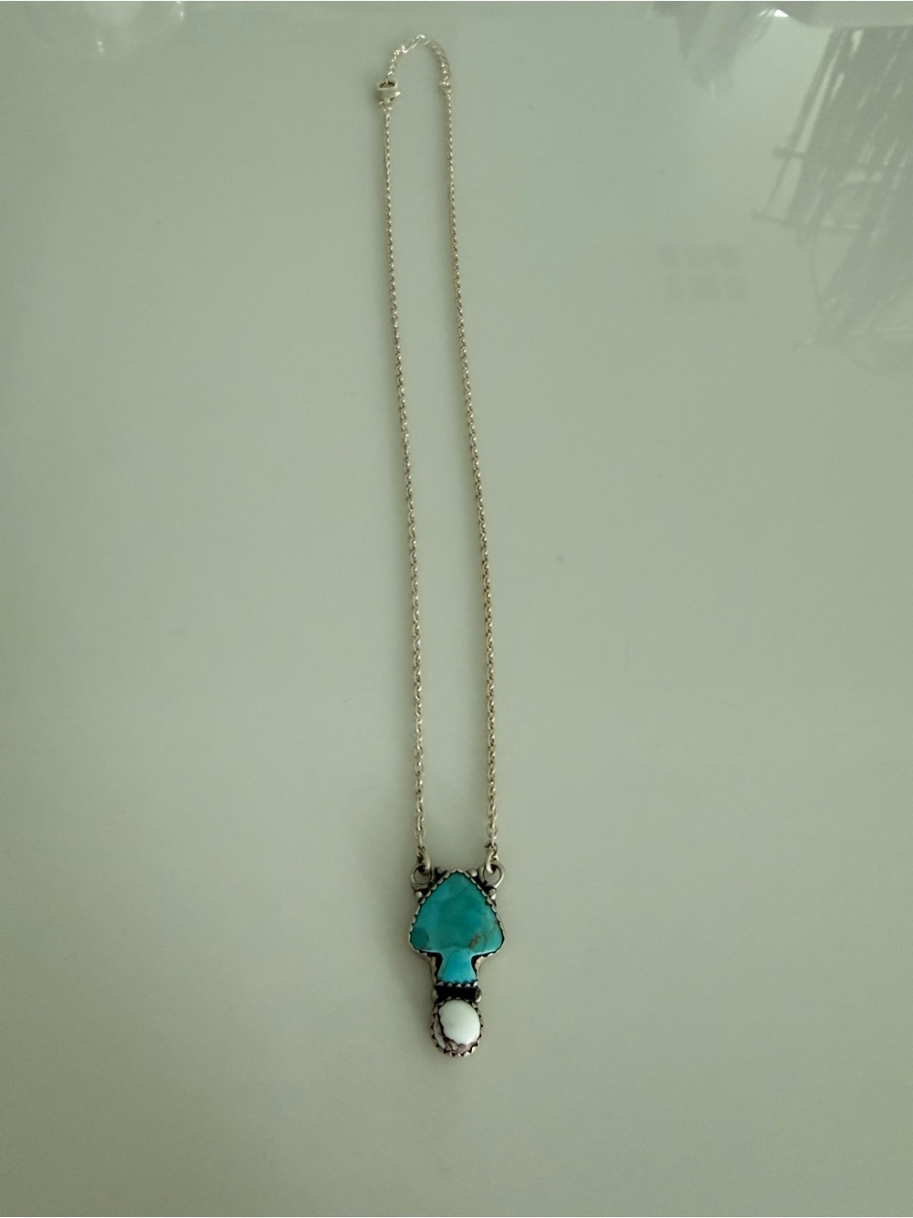 Nizhoni Traders Kingman Turquoise and Wild Horse Necklace in Sterling Silver